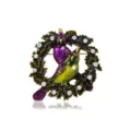 Antike Emaille-Vogelkranz-Brosche mit schillernden Strasssteinen und edlem Gold-Finish. - Lila