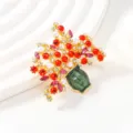 Elegant gold-tone flower vase brooch decorated with red rhinestones and green enamel. - Flower Vase Style(HC0266)