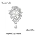 Grande spilla con strass scintillanti e ciondolo a goccia in finitura argento - Argento
