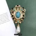 Vintage Baroque brooch in matte gold finish with turquoise stone and pearl teardrop - Baroque Palace Blue Stone / Matte Gold