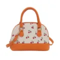 Modische Damen-Schalentasche mit Kirschprint und orangen Kunstledergriffen für Alltag - Orange