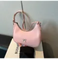 Elegante bolso de hombro rosa tipo silla con decoración de lazo plateado para mujer - Rosa