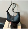 Elegante zwarte hobo-tas met een zilveren strikdetail voor de dames-herfstmode - Zwart