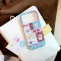 Close-up detail of a soft phone case featuring cute ragdoll cat and animal illustrations - Magnetic Patchwork Illustration / iPhone 18 Pro Max