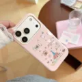 Detailed view of pink iPhone case with cute cartoon dachshund illustrations and glossy finish - iPhone 18 Pro Max / Berry Pink Starry Puppy Party