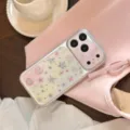 Detail view of pink iPhone case with glittery heart and star patterns - Gilded Falling Stars / 17Promax / Silver