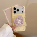 Détail de la coque iPhone avec un support chien 3D mignon et motifs nœuds - 17promax / Jaune Mangue Points Violets de Brouillard + Support Lapin