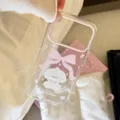 Cute Cream Puppy transparent iPhone case with pink bow and glitter details. - Transparent Glitter Cream Puppy / iPhone 18