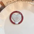 Detail of vintage red heart-shaped magnetic phone ring stand on a decorative plate - Heart Magnetic Stand / Single Stand / Salt Cherry Star