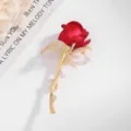 Detailed view of an elegant red rose brooch featuring a gold stem and crystals - Red Rose (X163)
