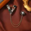 Elegant vintage-style rhinestone encrusted V brooch with tassel chains on brown silk background - Letter V Tassel Style (Style 1)