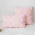 Soft pink plush decorative pillowcase featuring embossed yellow daisy floral patterns - Light Pink