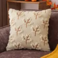 Autumn cream pillowcase featuring 3D plush maple leaf embroidery for cozy sofa decor - Beige Drifting Leaf With Brown Stem
