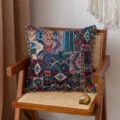 Vintage ethnic style bohemian pattern cushion cover with colorful tassels on chair - Blue