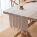 Elegante camino de mesa de rayas huecas con borlas para mesa de comedor y hogar - 35*200cm / Beige Café