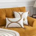 Bohemian Nordic style tufted cushion covers with tassels shown on a cozy yellow velvet sofa - Coffee Semicircle