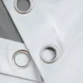 Close-up detail of a light grey velvet curtain featuring durable silver metal grommets - Grommet Type / 70*120cm 1 Piece (27*47 Inches) / Grayish White