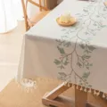 Elegant cream linen tablecloth featuring green leaf embroidery and decorative tassels - 60*60cm / Green