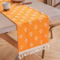 Camino de mesa de algodón naranja con estrellas tejidas y borlas - Naranja