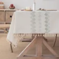 Luxury cream embroidered tablecloth with elegant green shell pattern and tassel trim - Teal