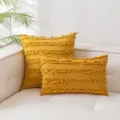 Senfgelbes Boho-Dekokissen mit Fransen-Details auf einem beigen Sofa - 45*45cm Ohne Kern / Kurkuma