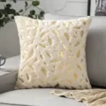 Housse de coussin en fausse fourrure crème avec un motif élégant de plumes dorées - Or champagne