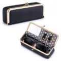 Portable black pebbled leather glasses case with gold clasp and polka dot lining - Black