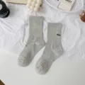 Cozy grey thick mid-calf socks featuring rib-knit texture and small embroidered detail - One Size (35-40) / Thin Style / Light Gray