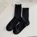 Black ruffled mid-tube socks with cute lettuce edge design, perfect for daily college style wear. - One Size (34-40) / Black