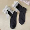 Schwarze Lolita-Wadenstrümpfe im japanischen Stil mit weißen Spitzenrüschen und Schleifen - Einheitsgröße / Schwarz