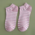 Pair of soft cotton pink and white striped low-cut ankle socks for women on green backdrop - One Size (36-39) / Pink (1 Pair)