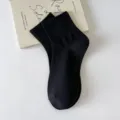 Calcetines negros minimalistas para mujer con puños acanalados y cómodo tacto de algodón - Talla Única (34-40) / Negro