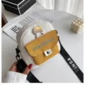 Bolso bandolera de lona estilo Harajuku con bolsillo amarillo y parche de dibujos - Blanco