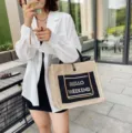 Large minimalist linen tote bag with Hello Weekend print for women's daily commuting - Black