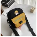 Linda bolsa de mensajero de lona estilo Harajuku en negro y amarillo con parche bordado - Negro
