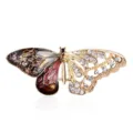 Detailed view of vintage butterfly brooch with crystal filigree and enamel wing textures - Style 2