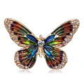 Close-up of a vintage colorful enamel butterfly brooch featuring crystal accents - Style 6