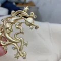 Close-up of a vintage baroque gold brooch featuring a crescent moon and stars with crystals - Moon Star Planet (SMT1005003337135751) / Moon