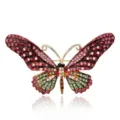 Close-up of vintage butterfly brooch with colorful rhinestones and gold finish - Style 9
