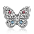 Silver butterfly brooch featuring colorful crystals and retro design elements - Style 22