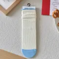 Elegantes calcetines acanalados blanco crema con ribete azul y diseño de lazos - Talla Única (35-40) / Estilo Jacquard con Lazo (Lazo)