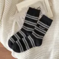 Warm black striped socks with fuzzy grey accents and 'As You Wish' embroidery detail - One Size / Black