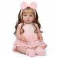 Realistic 22 inch reborn baby doll Missy in a pink lace dress with a bow headband - Pink / 21 Inches