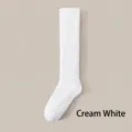 Soft milk white coral fleece knee-high fuzzy sleeping socks for winter home warmth. - One Size (35-42) / Cream White