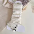 Cozy beige knitted leg warmers with three black buttons, perfect college style winter socks. - One Size / White