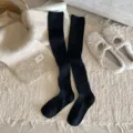 Chaussettes longues tricotées côtelées noires pour femmes, mode automne hiver confortable. - Taille unique (35-41) / Noir
