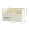 Cream colored multi-compartment desk organizer with dimensions of 16.5cm width - White
