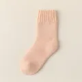Cozy woolen mid-calf sock in soft peach color, perfect for winter warmth and daily casual wear. - 35% Wool Content (Size 34-40) / Light Orange