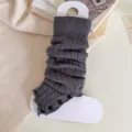 Grey knitted leg warmers for women, cozy winter button design, college style. - One Size / Dark Gray