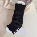 Black knitted leg warmers with three white buttons, slouchy style boot cuffs for women and girls. - One Size / Black